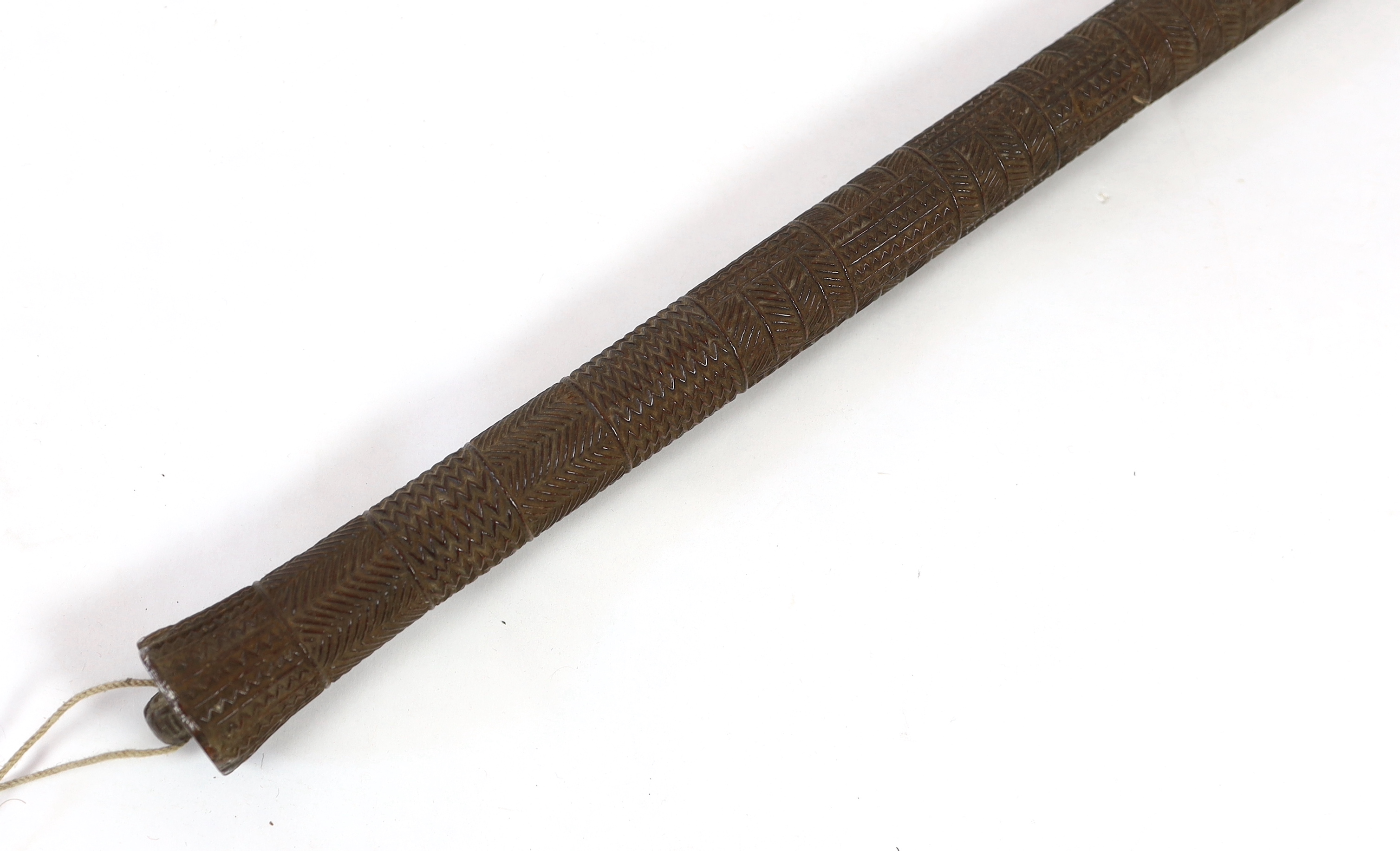 A Polynesian tribal Povai pole war club, Tonga, 19th century, 100cm long, 5cm largest diameter